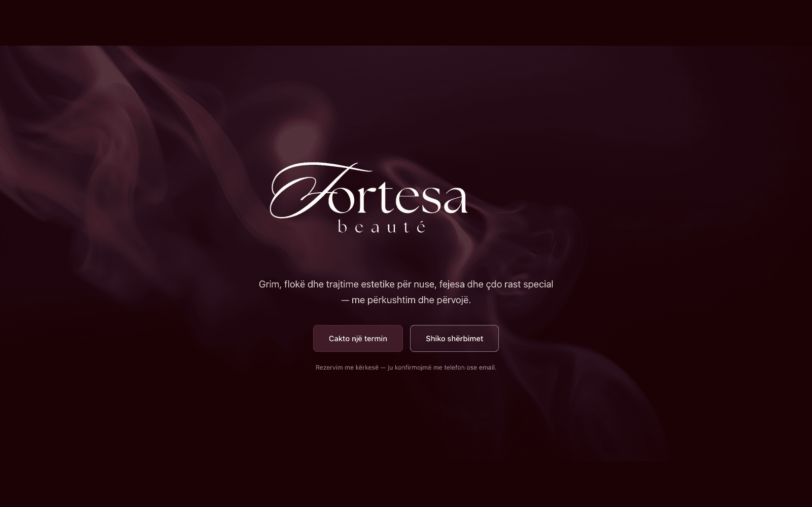 Landing hero — the cinematic wine-toned opening, with an animated smoke layer behind the salon's script mark